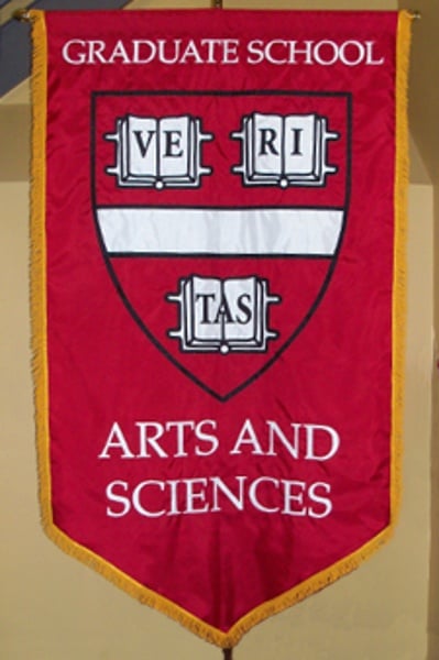 An appliqued gonfalon for Harvard University graduate school of Arts and Sciences graduation ceremony.