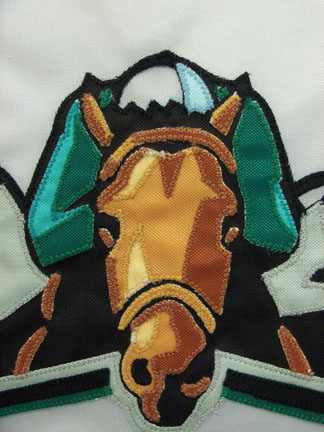 A close up of a truly unique blanket made for the winning horse in the Belmont Stakes.