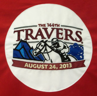 A close up of the appliqued logo on the fleece blanket for the Travers Race in Saratoga Springs, NY.
