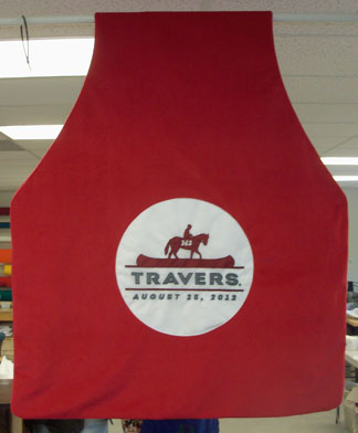 This fleece blanket has an appliqued logo and is made to drape over the winning horse of the Travers Race in Saratoga Springs, NY.