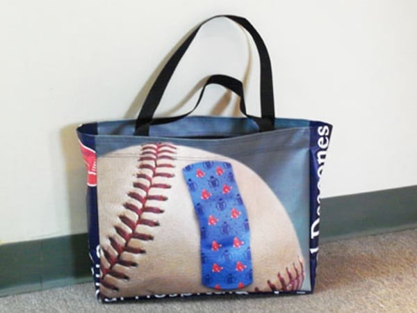 Tote bag made from recycled Beth Israel Deaconess Medical Center / Red Sox pole banners.