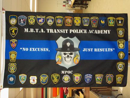 Incorporating applique, print and embroidered patches this flag for the M.B.T.A. Police Academy is the very definition of a hybrid flag.